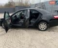 Черный Тойота Камри, объемом двигателя 2.4 л и пробегом 181 тыс. км за 9200 $, фото 1 на Automoto.ua