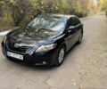 Чорний Тойота Камрі, об'ємом двигуна 2.4 л та пробігом 350 тис. км за 6399 $, фото 1 на Automoto.ua