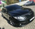 Черный Тойота Камри, объемом двигателя 2.4 л и пробегом 212 тыс. км за 11400 $, фото 1 на Automoto.ua
