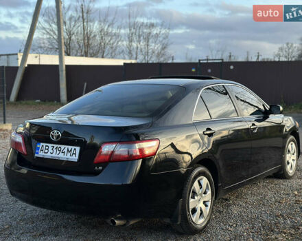 Чорний Тойота Камрі, об'ємом двигуна 2.4 л та пробігом 297 тис. км за 7999 $, фото 15 на Automoto.ua