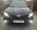 Черный Тойота Камри, объемом двигателя 3.5 л и пробегом 255 тыс. км за 11800 $, фото 23 на Automoto.ua