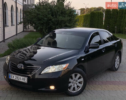 Чорний Тойота Камрі, об'ємом двигуна 2.4 л та пробігом 275 тис. км за 7750 $, фото 1 на Automoto.ua
