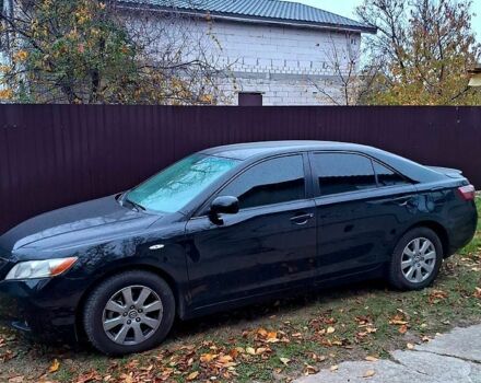 Чорний Тойота Камрі, об'ємом двигуна 2.4 л та пробігом 262 тис. км за 4750 $, фото 1 на Automoto.ua