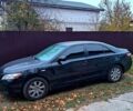 Чорний Тойота Камрі, об'ємом двигуна 2.4 л та пробігом 262 тис. км за 4750 $, фото 1 на Automoto.ua