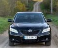 Черный Тойота Камри, объемом двигателя 2.4 л и пробегом 250 тыс. км за 6799 $, фото 1 на Automoto.ua