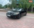 Чорний Тойота Камрі, об'ємом двигуна 2.4 л та пробігом 348 тис. км за 5300 $, фото 1 на Automoto.ua
