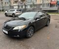 Черный Тойота Камри, объемом двигателя 3.5 л и пробегом 255 тыс. км за 9900 $, фото 1 на Automoto.ua