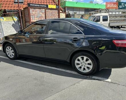 Черный Тойота Камри, объемом двигателя 2.4 л и пробегом 306 тыс. км за 10500 $, фото 2 на Automoto.ua