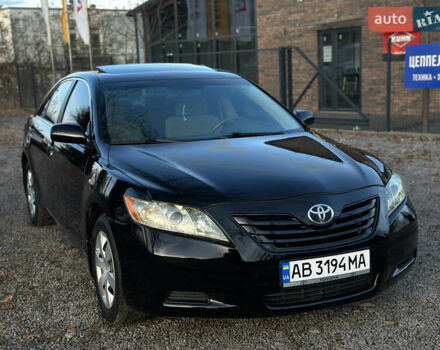 Чорний Тойота Камрі, об'ємом двигуна 2.4 л та пробігом 297 тис. км за 7999 $, фото 1 на Automoto.ua