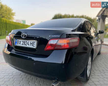 Чорний Тойота Камрі, об'ємом двигуна 2.4 л та пробігом 275 тис. км за 7750 $, фото 28 на Automoto.ua