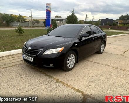 Черный Тойота Камри, объемом двигателя 3.5 л и пробегом 200 тыс. км за 10000 $, фото 1 на Automoto.ua
