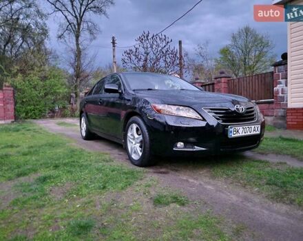 Чорний Тойота Камрі, об'ємом двигуна 2.36 л та пробігом 299 тис. км за 8888 $, фото 6 на Automoto.ua