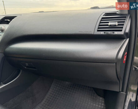 Черный Тойота Камри, объемом двигателя 2.4 л и пробегом 192 тыс. км за 10500 $, фото 21 на Automoto.ua