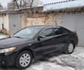 Черный Тойота Камри, объемом двигателя 2.4 л и пробегом 173 тыс. км за 8300 $, фото 1 на Automoto.ua