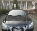 Чорний Тойота Камрі, об'ємом двигуна 2.4 л та пробігом 240 тис. км за 7800 $, фото 1 на Automoto.ua