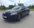 Черный Тойота Камри, объемом двигателя 2.36 л и пробегом 325 тыс. км за 8000 $, фото 1 на Automoto.ua