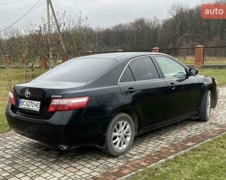 Черный Тойота Камри, объемом двигателя 2.4 л и пробегом 227 тыс. км за 8600 $, фото 1 на Automoto.ua