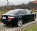 Черный Тойота Камри, объемом двигателя 2.4 л и пробегом 227 тыс. км за 8600 $, фото 1 на Automoto.ua