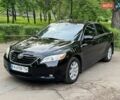 Черный Тойота Камри, объемом двигателя 2.36 л и пробегом 222 тыс. км за 9700 $, фото 1 на Automoto.ua