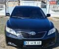 Черный Тойота Камри, объемом двигателя 2.4 л и пробегом 218 тыс. км за 7300 $, фото 1 на Automoto.ua
