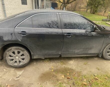 Черный Тойота Камри, объемом двигателя 2.4 л и пробегом 210 тыс. км за 2300 $, фото 1 на Automoto.ua