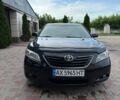 Черный Тойота Камри, объемом двигателя 3.5 л и пробегом 226 тыс. км за 7700 $, фото 1 на Automoto.ua
