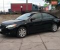 Черный Тойота Камри, объемом двигателя 2.4 л и пробегом 304 тыс. км за 6990 $, фото 2 на Automoto.ua