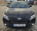 Черный Тойота Камри, объемом двигателя 3.5 л и пробегом 255 тыс. км за 11800 $, фото 1 на Automoto.ua