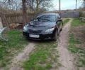 Чорний Тойота Камрі, об'ємом двигуна 3.5 л та пробігом 195 тис. км за 9800 $, фото 1 на Automoto.ua
