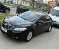 Черный Тойота Камри, объемом двигателя 2.4 л и пробегом 195 тыс. км за 8000 $, фото 1 на Automoto.ua