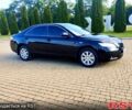 Черный Тойота Камри, объемом двигателя 2.4 л и пробегом 293 тыс. км за 8400 $, фото 1 на Automoto.ua