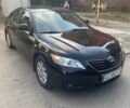 Чорний Тойота Камрі, об'ємом двигуна 2.4 л та пробігом 300 тис. км за 7500 $, фото 1 на Automoto.ua