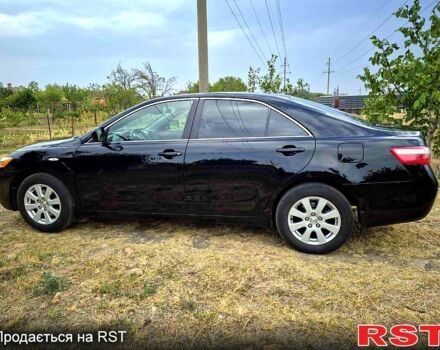 Черный Тойота Камри, объемом двигателя 2.4 л и пробегом 194 тыс. км за 8300 $, фото 1 на Automoto.ua