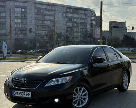 Черный Тойота Камри, объемом двигателя 3.5 л и пробегом 235 тыс. км за 8300 $, фото 1 на Automoto.ua