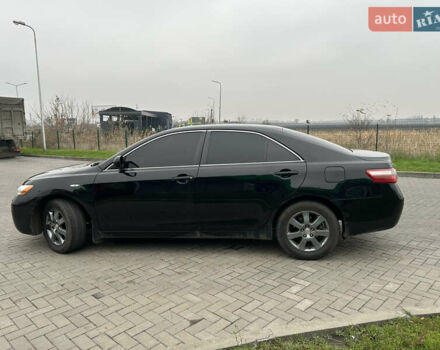 Чорний Тойота Камрі, об'ємом двигуна 2.4 л та пробігом 285 тис. км за 7800 $, фото 2 на Automoto.ua