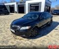 Черный Тойота Камри, объемом двигателя 2.4 л и пробегом 303 тыс. км за 8100 $, фото 1 на Automoto.ua