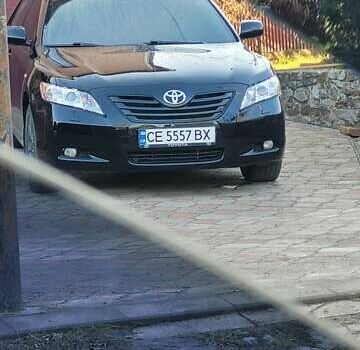 Черный Тойота Камри, объемом двигателя 3.5 л и пробегом 255 тыс. км за 11800 $, фото 2 на Automoto.ua