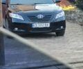 Черный Тойота Камри, объемом двигателя 3.5 л и пробегом 255 тыс. км за 11800 $, фото 2 на Automoto.ua