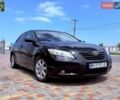 Черный Тойота Камри, объемом двигателя 2.4 л и пробегом 270 тыс. км за 8700 $, фото 1 на Automoto.ua