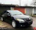 Черный Тойота Камри, объемом двигателя 2.4 л и пробегом 183 тыс. км за 7800 $, фото 1 на Automoto.ua