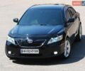Черный Тойота Камри, объемом двигателя 3.5 л и пробегом 250 тыс. км за 9700 $, фото 1 на Automoto.ua