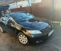 Чорний Тойота Камрі, об'ємом двигуна 2.4 л та пробігом 277 тис. км за 8700 $, фото 1 на Automoto.ua