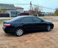 Чорний Тойота Камрі, об'ємом двигуна 2.4 л та пробігом 262 тис. км за 4750 $, фото 4 на Automoto.ua