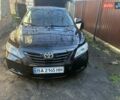 Чорний Тойота Камрі, об'ємом двигуна 2.4 л та пробігом 277 тис. км за 8700 $, фото 1 на Automoto.ua