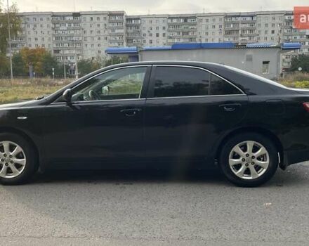Черный Тойота Камри, объемом двигателя 2.36 л и пробегом 190 тыс. км за 8000 $, фото 1 на Automoto.ua