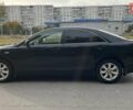 Черный Тойота Камри, объемом двигателя 2.36 л и пробегом 190 тыс. км за 8000 $, фото 1 на Automoto.ua