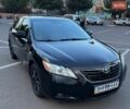 Черный Тойота Камри, объемом двигателя 2.4 л и пробегом 221 тыс. км за 6900 $, фото 1 на Automoto.ua