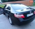 Черный Тойота Камри, объемом двигателя 2.4 л и пробегом 300 тыс. км за 7100 $, фото 1 на Automoto.ua
