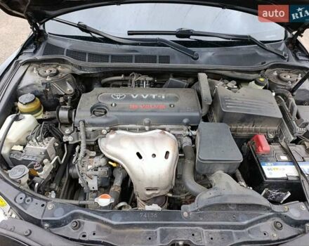 Черный Тойота Камри, объемом двигателя 2.4 л и пробегом 268 тыс. км за 8800 $, фото 21 на Automoto.ua