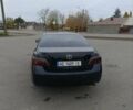 Черный Тойота Камри, объемом двигателя 2.4 л и пробегом 325 тыс. км за 7300 $, фото 16 на Automoto.ua